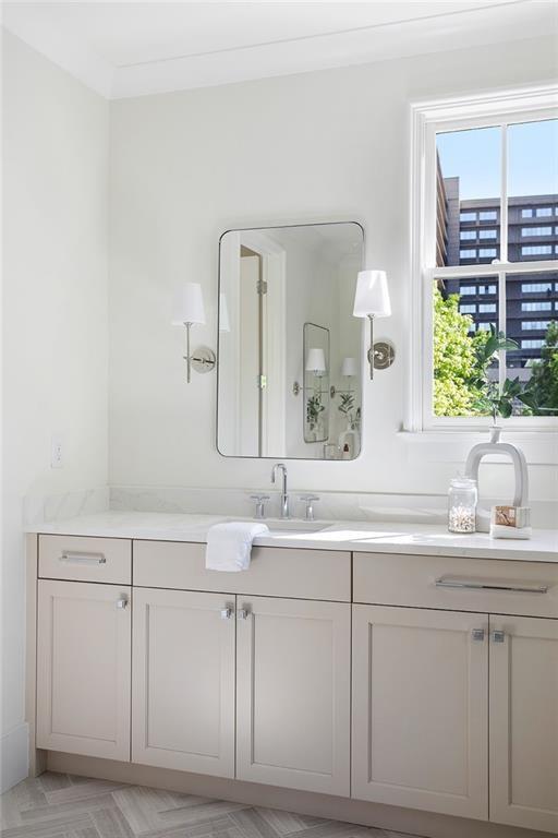 48 25th Atlanta, GA 30328 - Photo 28 of 48 a bathroom with a sink and a mirror