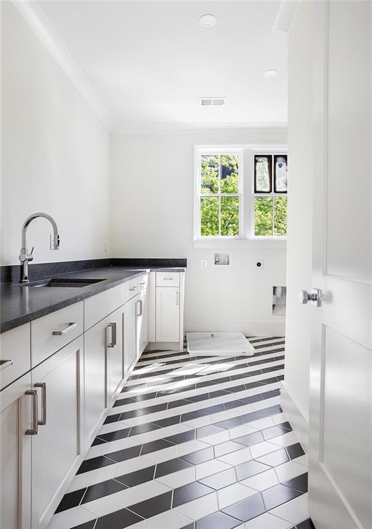 48 25th Atlanta, GA 30328 - Photo 36 of 48 a view of a kitchen with windows