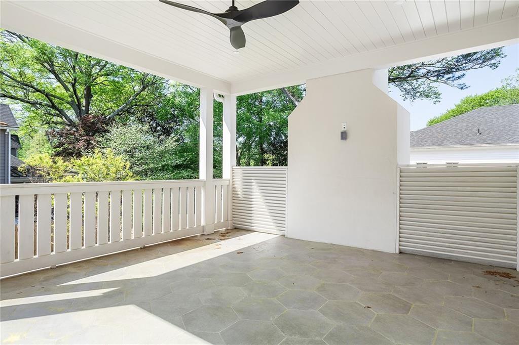 48 25th Atlanta, GA 30328 - Photo 41 of 48 a view of a balcony with a ceiling fan and window