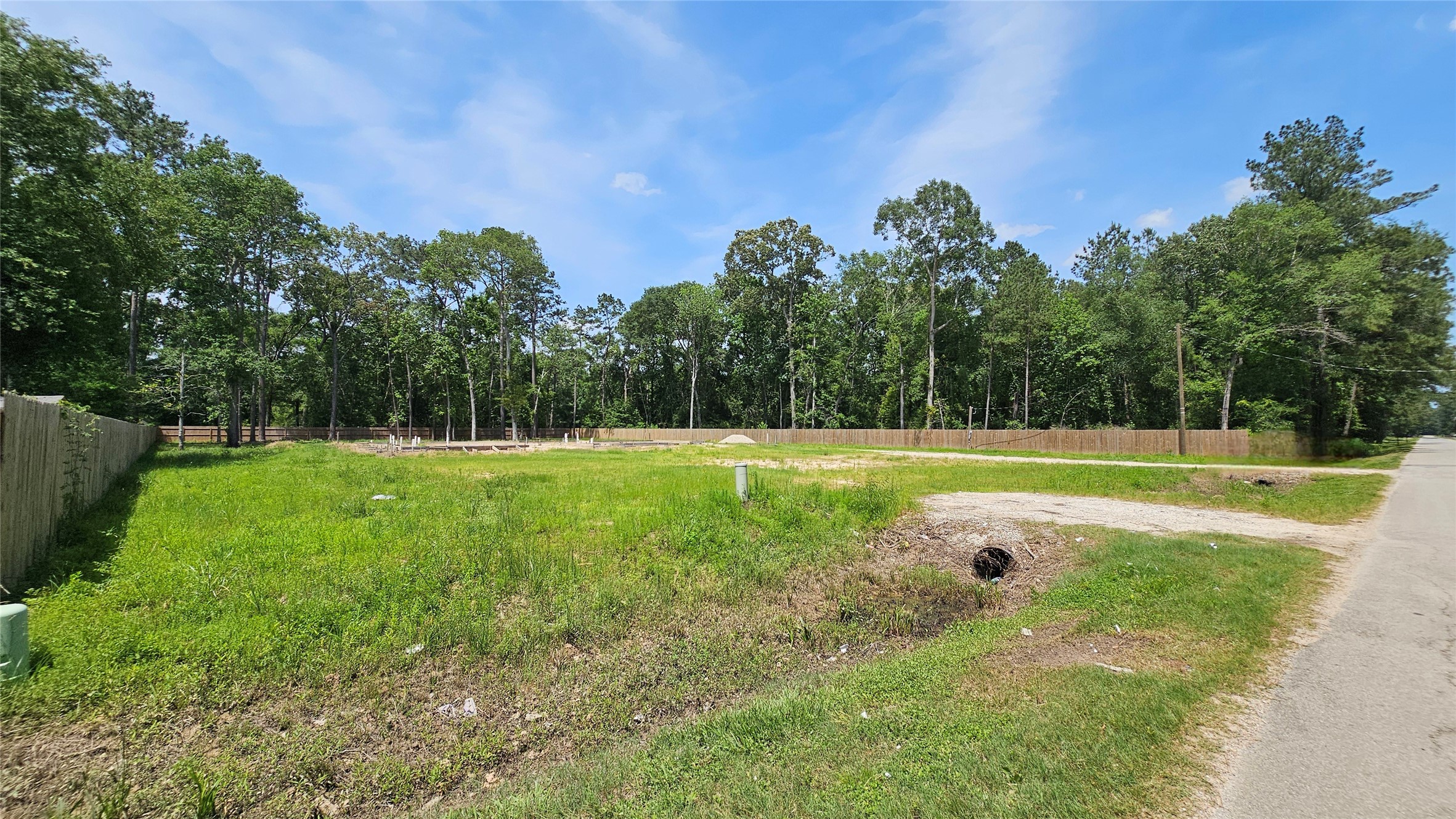 369 County Road 356 New Caney, TX 77357 - Photo 2 of 9 a view of a tennis court
