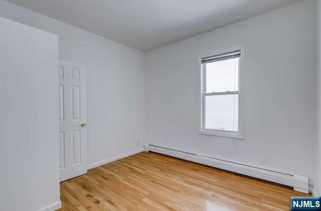 an empty room with window