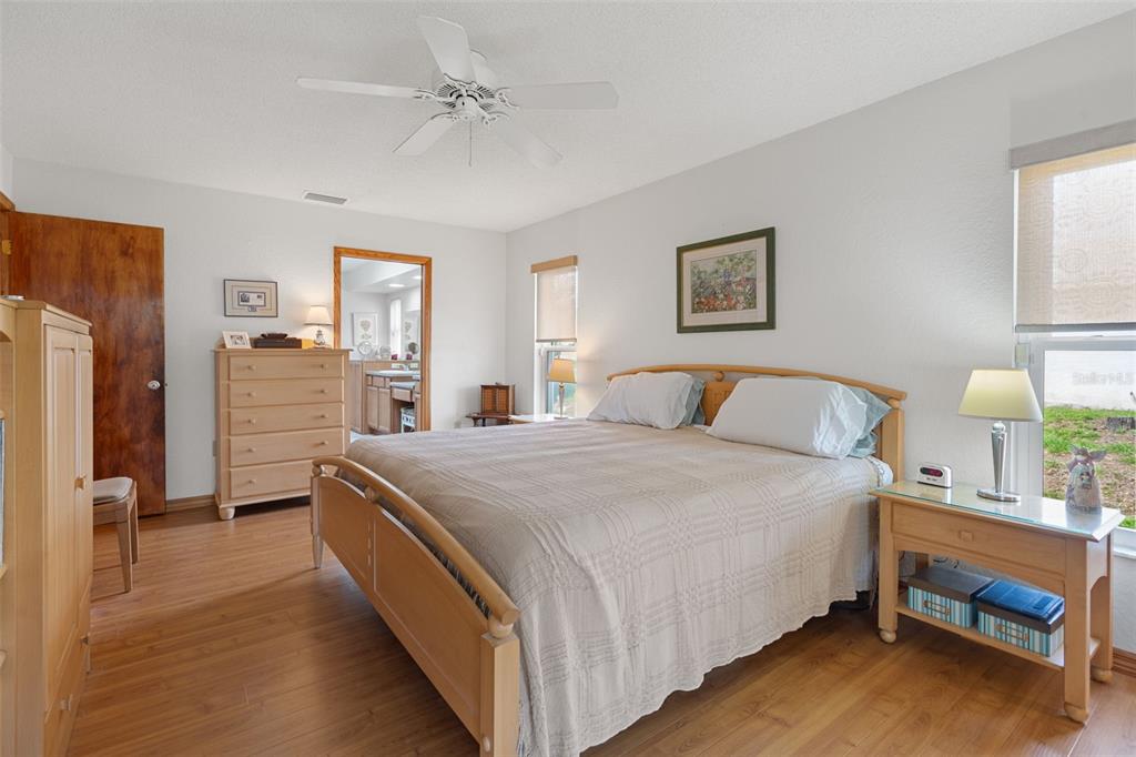 5035 Harbinger Road Spring Hill, FL 34608 - Photo 32 of 47 a bedroom with bed and window