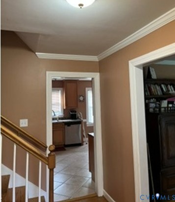 3732 Birdwood Road Richmond, VA 23234 - Photo 3 of 28 a kitchen with a refrigerator and a stove top oven