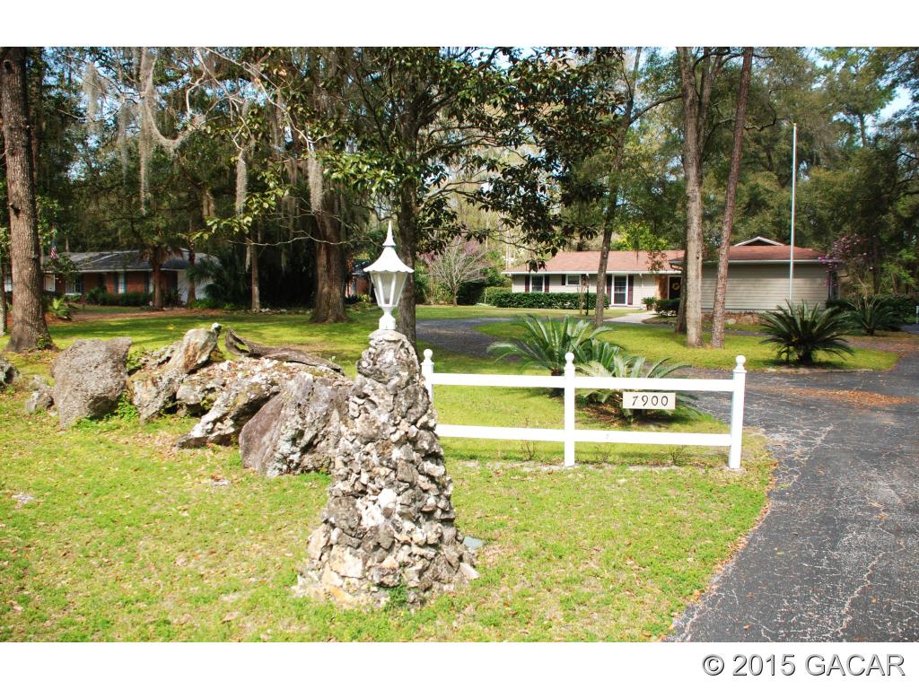 7900 Southwest 8th Avenue Gainesville, FL 32607 - Photo 2 of 24 Gate at Entry to Driveway
