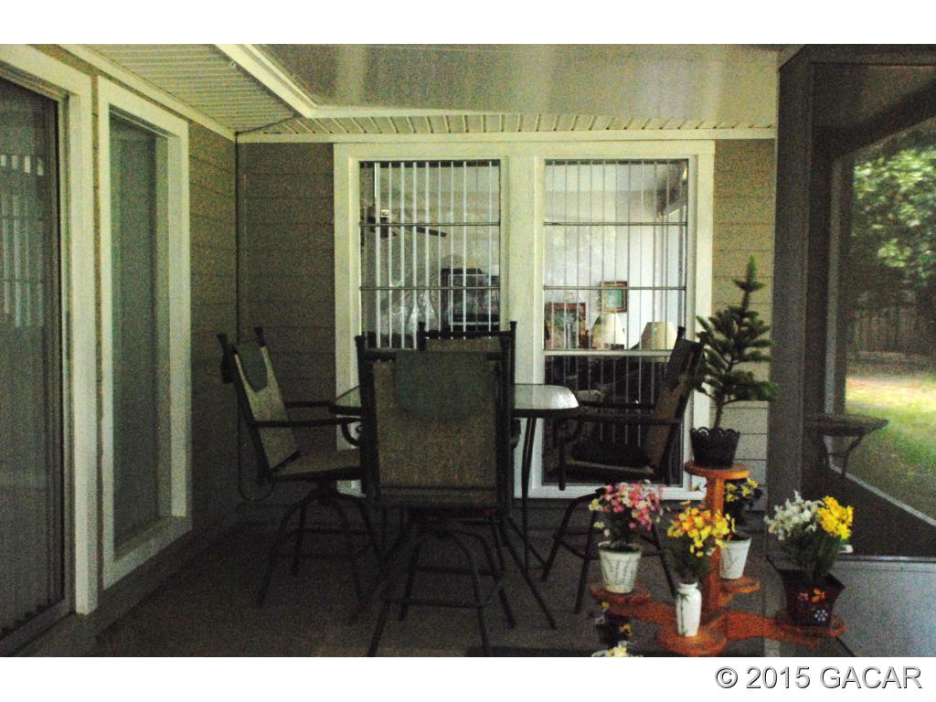 7900 Southwest 8th Avenue Gainesville, FL 32607 - Photo 20 of 24 Screened Porch