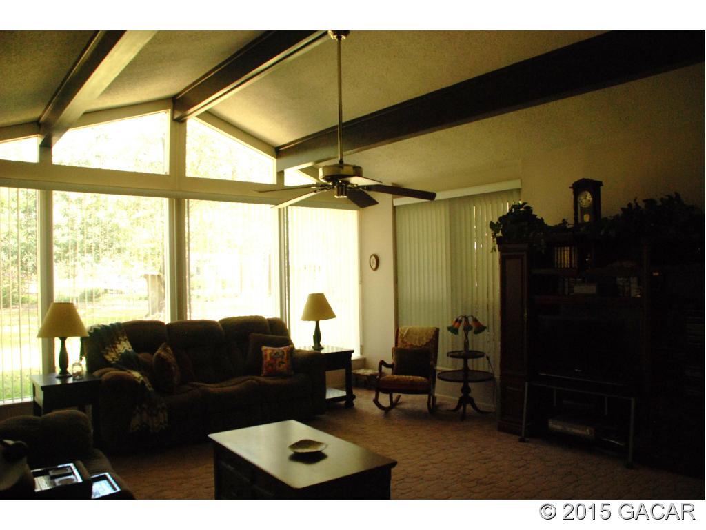 7900 Southwest 8th Avenue Gainesville, FL 32607 - Photo 7 of 24 Wall of Windows in Living Room