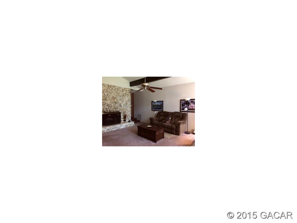 7900 Southwest 8th Avenue Gainesville, FL 32607 - Photo 8 of 24 Beamed Ceiling in Living Room