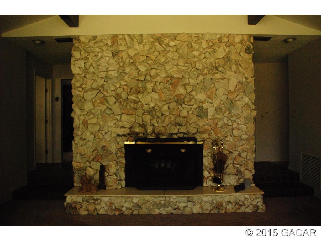 7900 Southwest 8th Avenue Gainesville, FL 32607 - Photo 9 of 24 Huge Stone fireplace