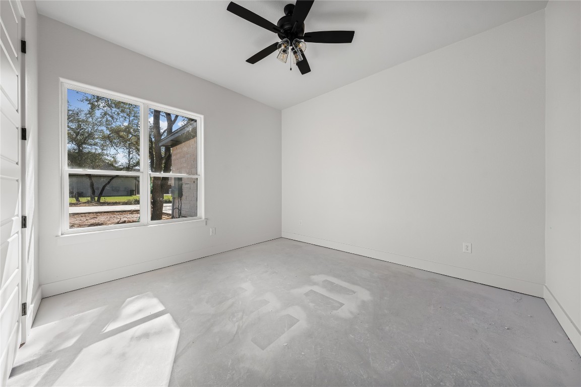 10213 Homesteader Road Gatesville, TX 76528 - Photo 15 of 19 a view of a livingroom with a ceiling fan and window