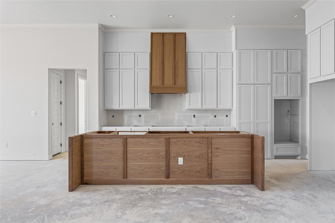 10213 Homesteader Road Gatesville, TX 76528 - Photo 5 of 19 a kitchen with stainless steel appliances granite countertop a refrigerator and a sink