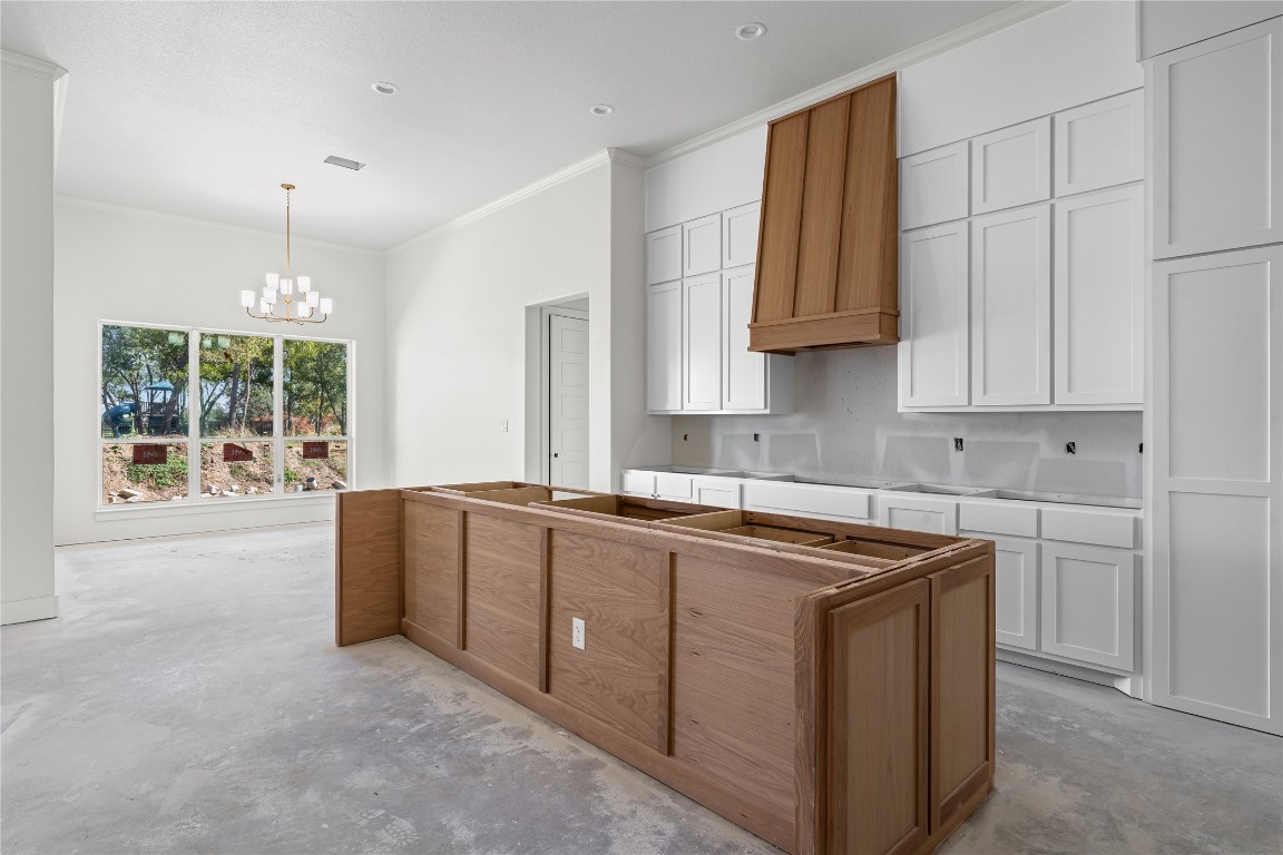 10213 Homesteader Road Gatesville, TX 76528 - Photo 6 of 19 a kitchen that has a sink and a stove in it