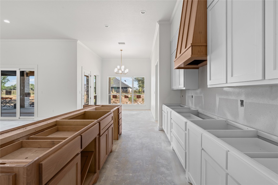 10213 Homesteader Road Gatesville, TX 76528 - Photo 7 of 19 a kitchen with stainless steel appliances granite countertop a sink and cabinets
