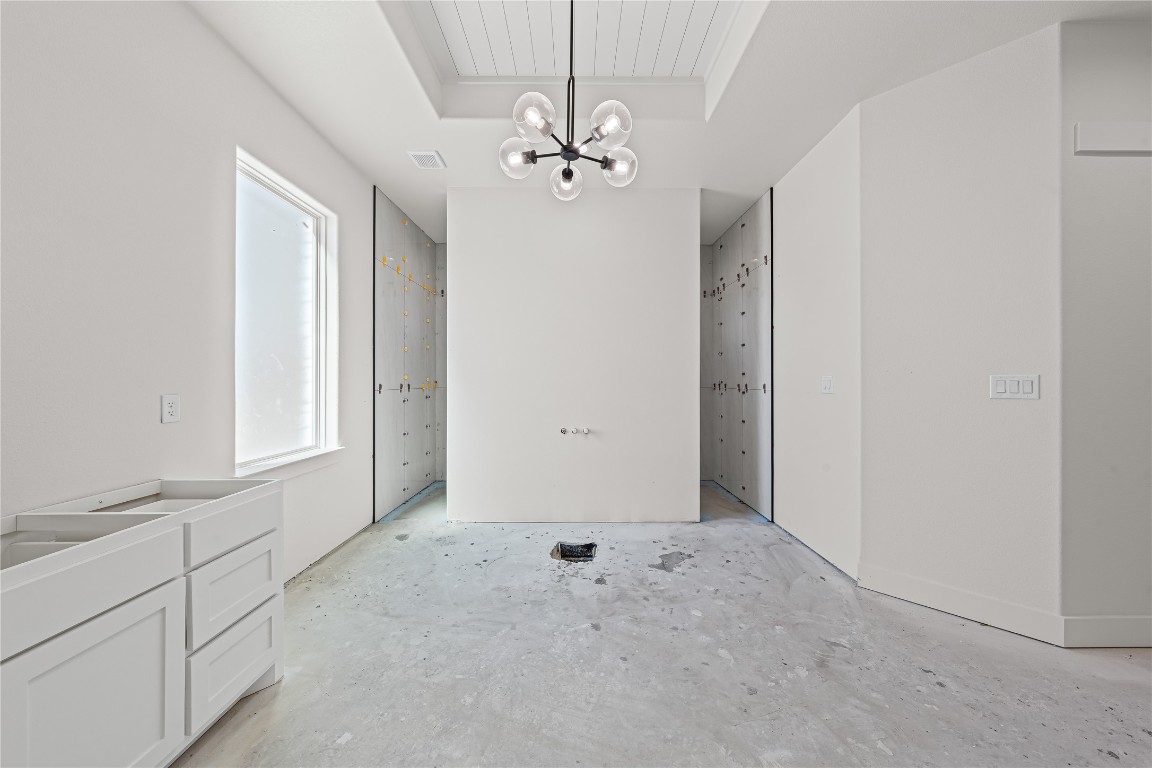 10213 Homesteader Road Gatesville, TX 76528 - Photo 9 of 19 an empty room with chandelier fan