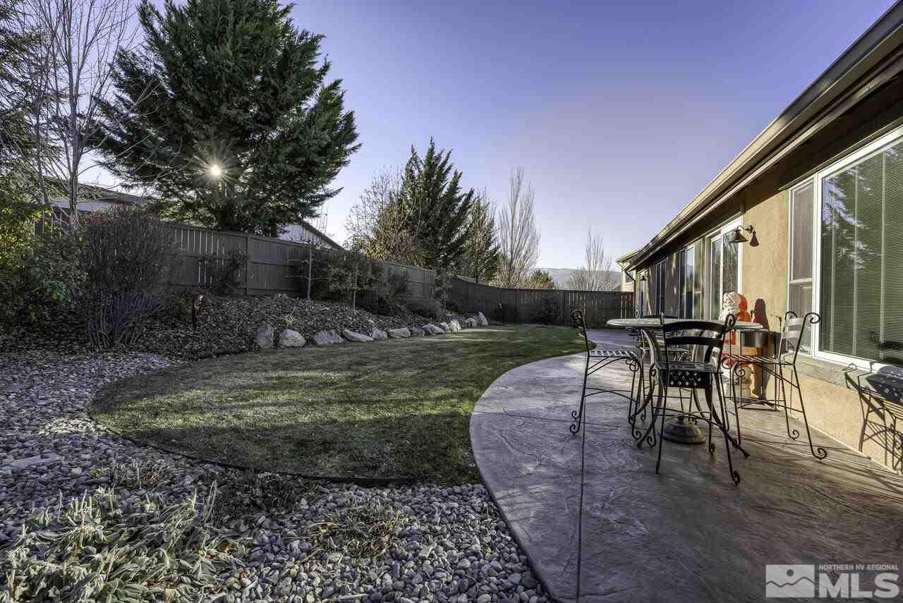 630 Preakness Court Reno, NV 89521 - Photo 36 of 39 a view of a backyard with sitting area