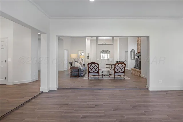 a view of a livingroom with furniture and window