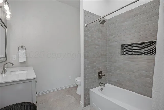 a bathroom with a sink and a bathtub