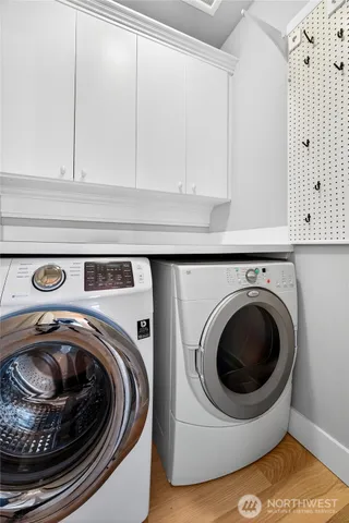 a utility room with dryer and washer