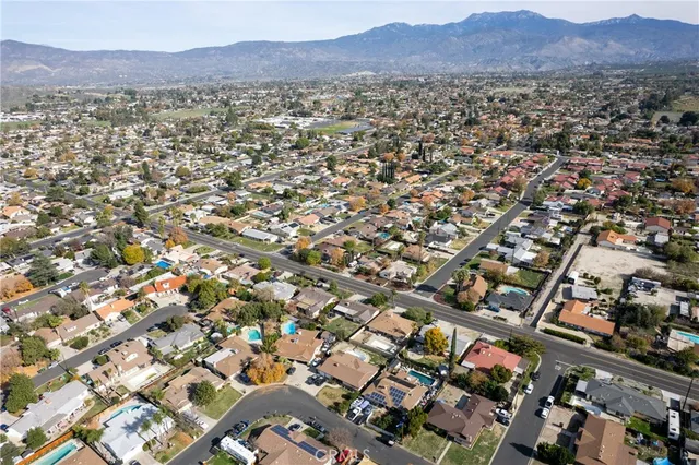 an aerial view of residential houses and city view