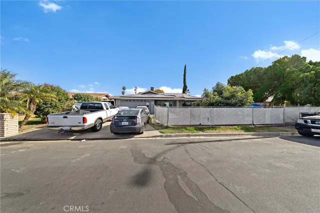 a view of a cars park on the roadside
