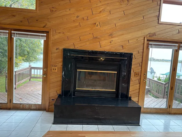 a living room with a fireplace