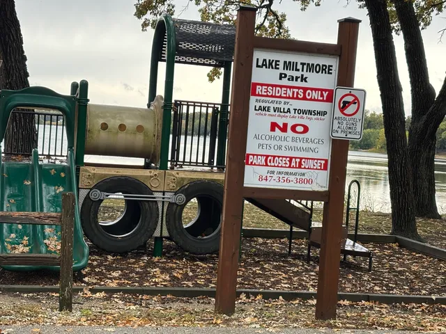 a sign board with a car park