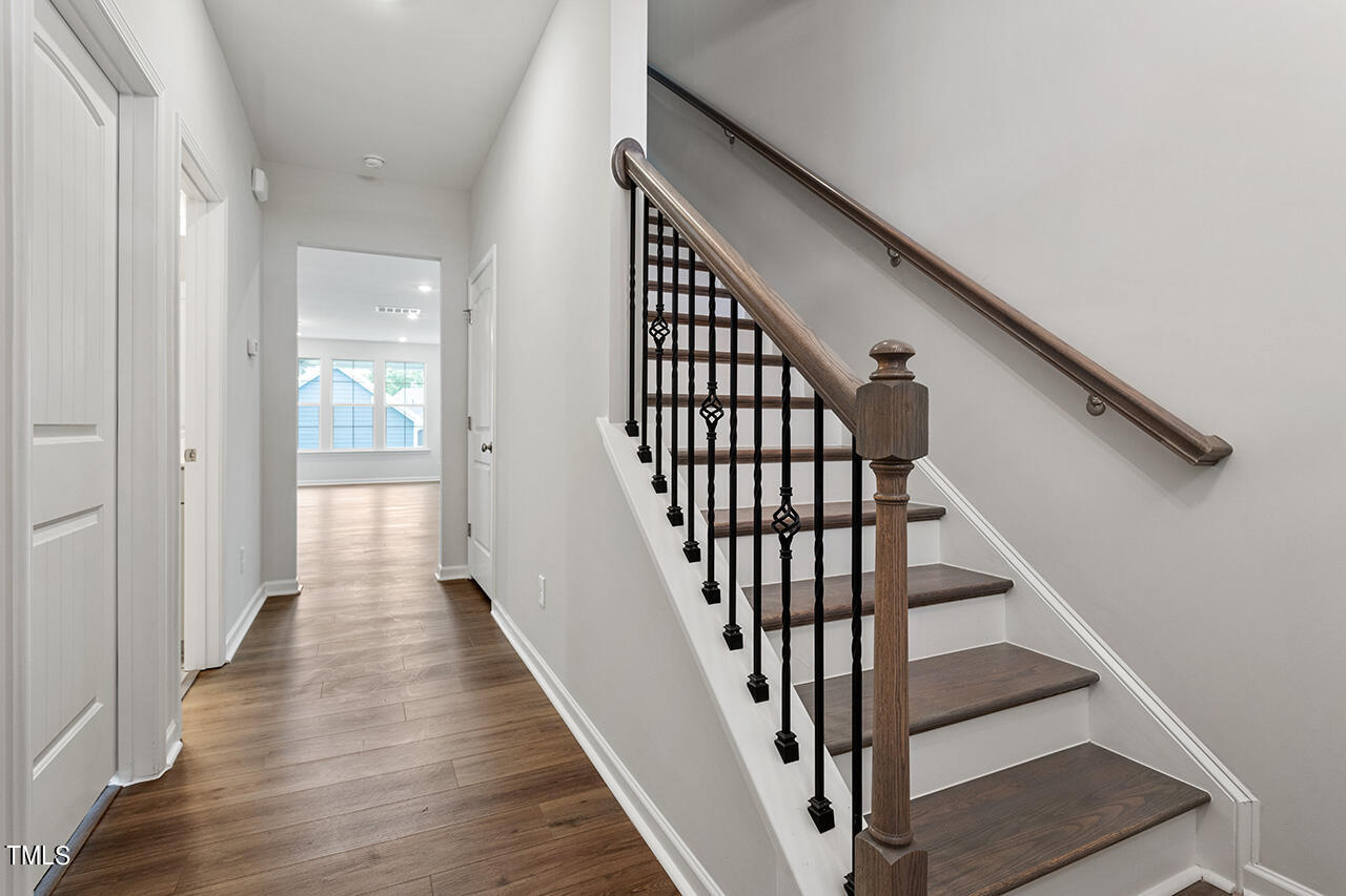 113 Savannah Moss Way Raleigh, NC 27603 - Photo 7 of 22 Hardwood Stairs