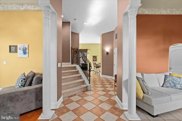 a living room with furniture and a couch