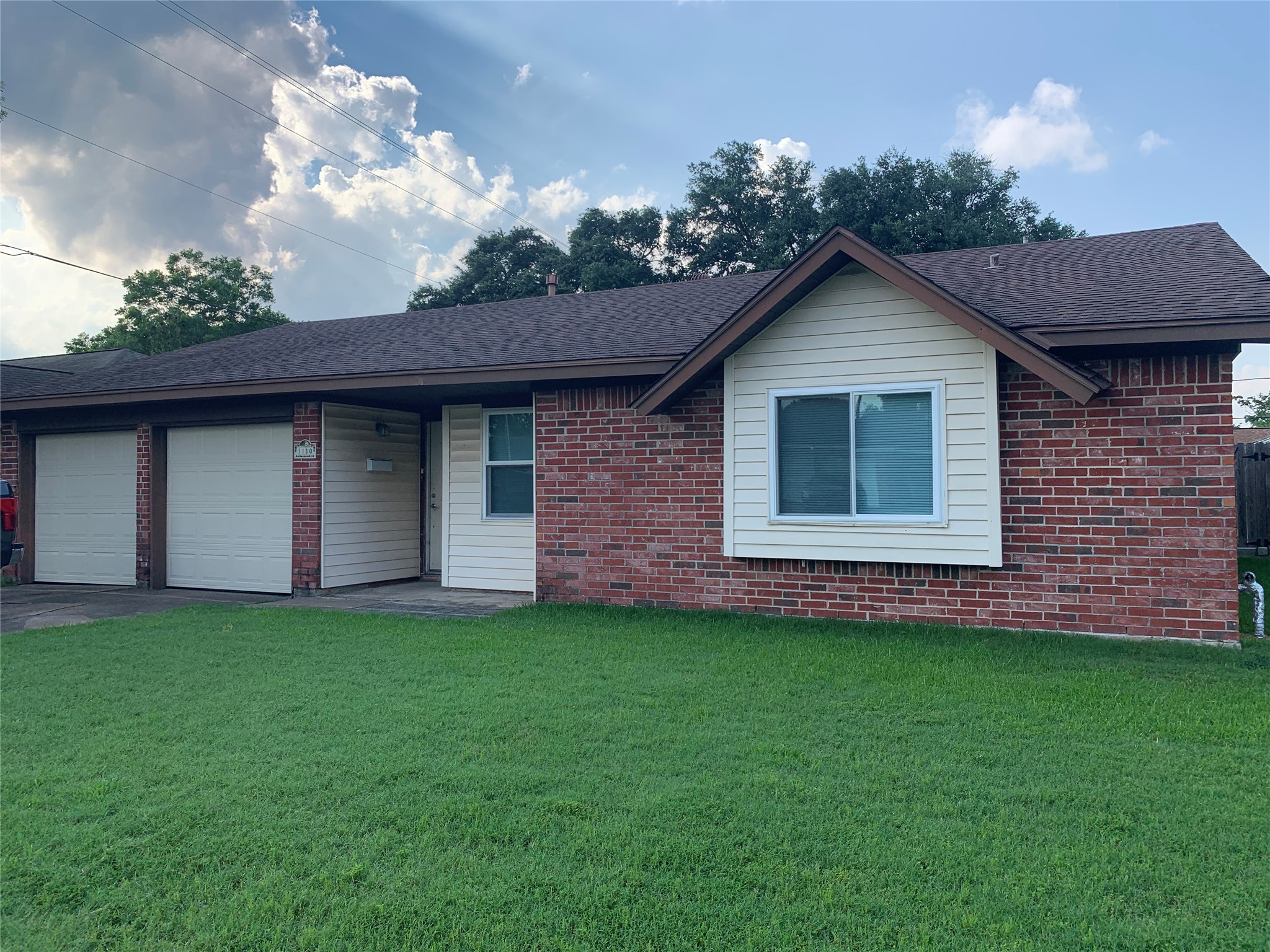 1110 East Rutgers Lane Deer Park, TX 77536 - Photo 1 of 19 Double wide drive to a two car garage with additional storage space.
