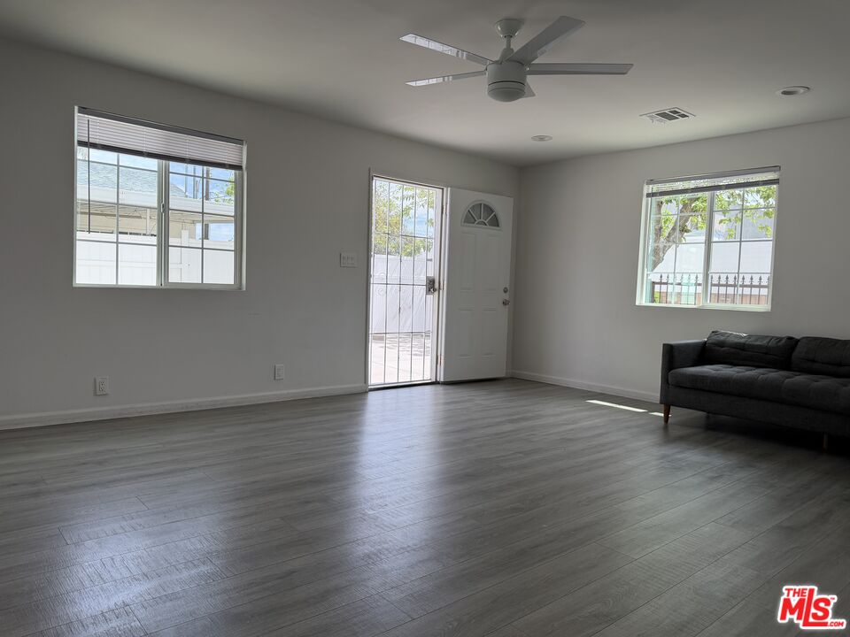 18601 Hiawatha Street Porter Ranch, CA 91326 - Photo 2 of 22 a view of a livingroom with furniture window and wooden floor