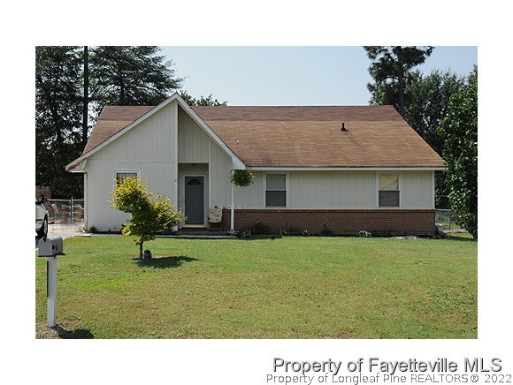 206 Duncan Road Spring Lake, NC 28390 - Photo 1 of 5 a view of a house with a backyard