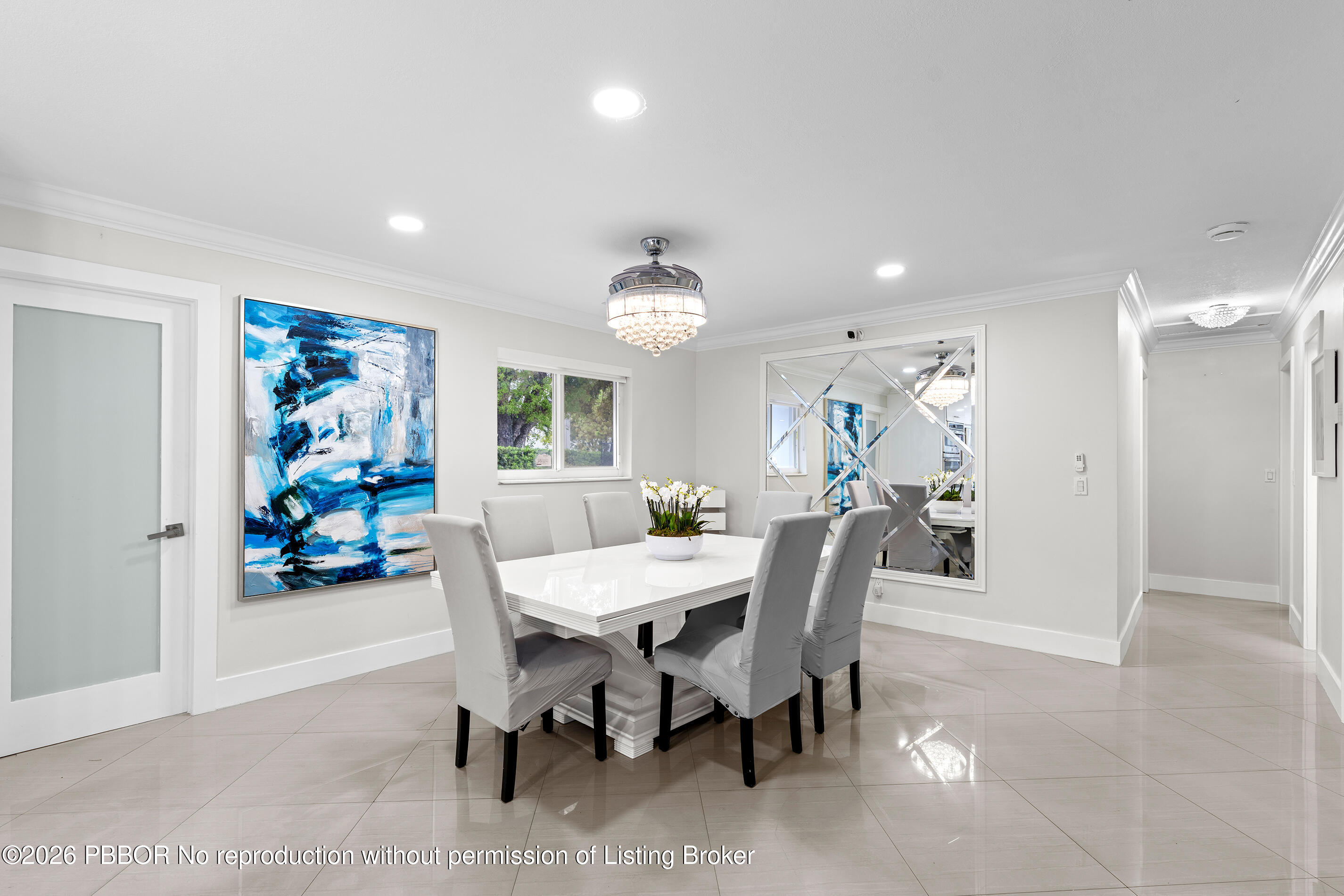 747 Avon Road West Palm Beach, FL 33401 - Photo 8 of 29 a view of a dining room with furniture and a livingroom