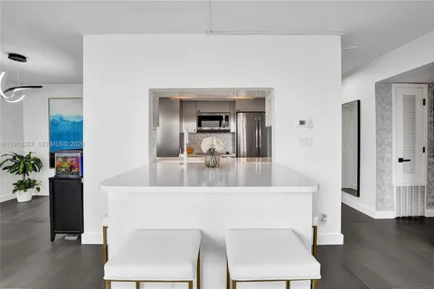 a en suite bathroom with a sink and a mirror