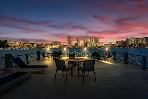 a view of a chairs and table on the terrace