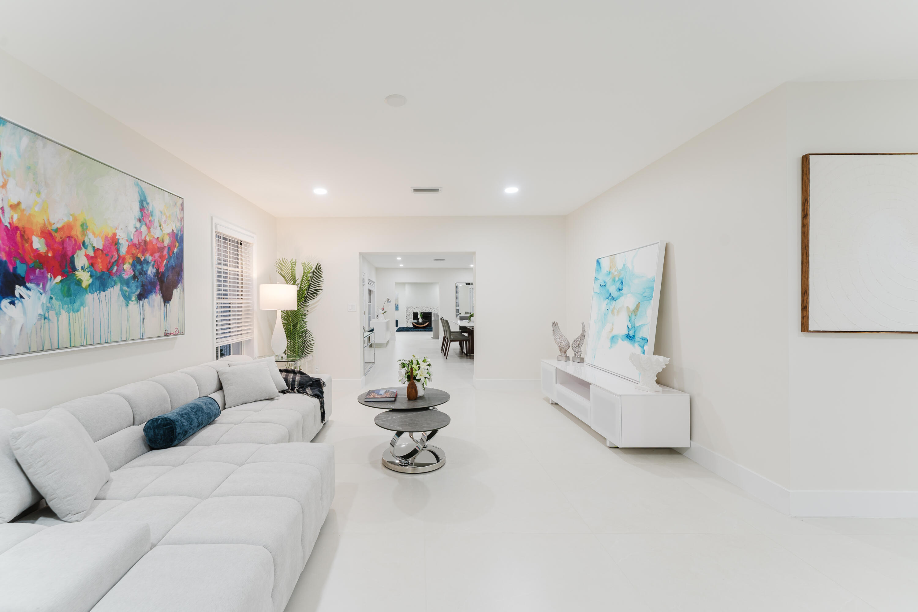 3199 Northeast 6th Drive Boca Raton, FL 33431 - Photo 11 of 49 a living room with furniture and a couch