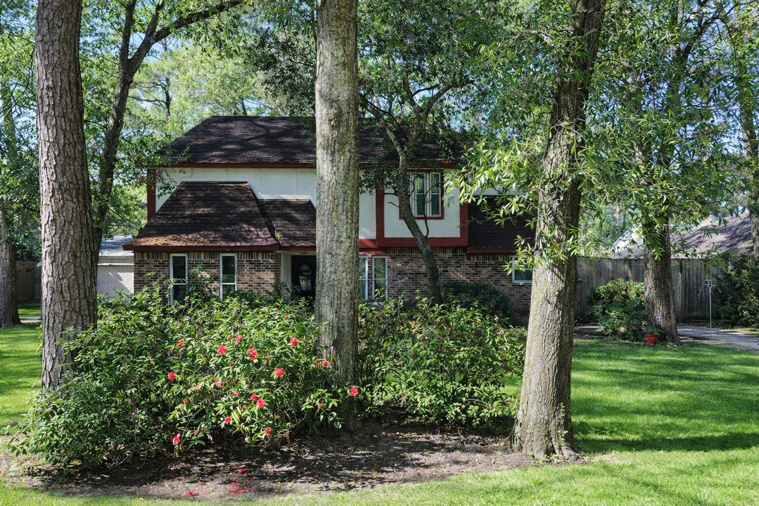 17423 Fairway Oaks Drive Spring, TX 77379 - Photo 2 of 50 WELCOME HOME. THIS UNIQUE PROPERTY OFFERS MANY UPGRADES (SEE IMPROVEMENT LIST) HAS A LARGE LOT, AND LUSH TREES.