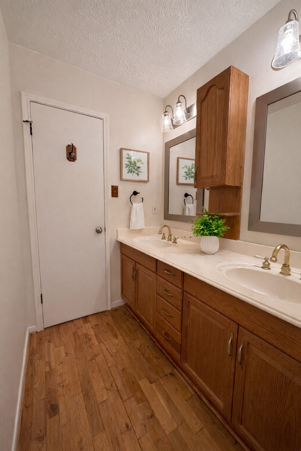 17423 Fairway Oaks Drive Spring, TX 77379 - Photo 21 of 50 a spacious bathroom with a double vanity sink and mirror