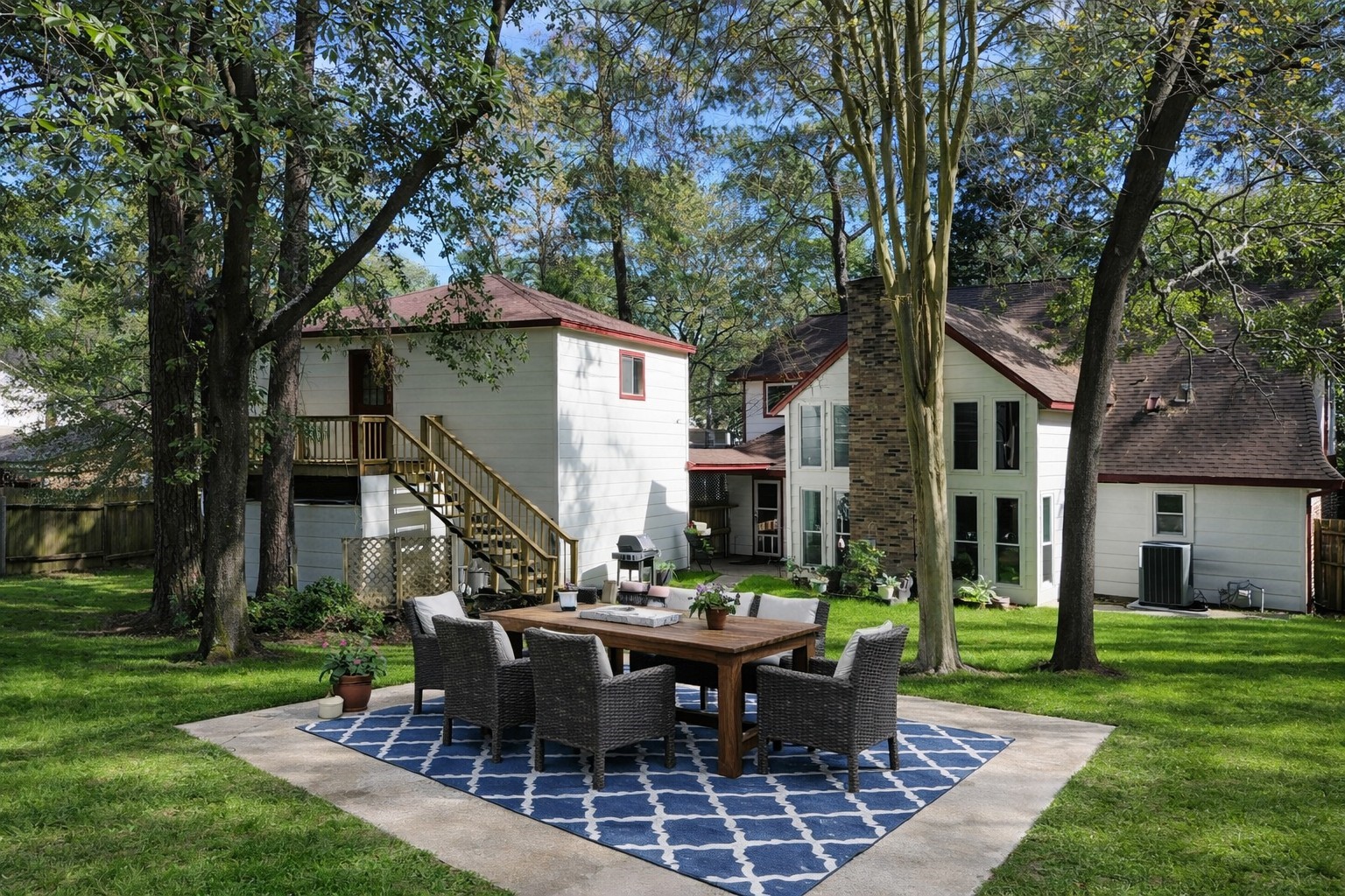17423 Fairway Oaks Drive Spring, TX 77379 - Photo 24 of 50 a view of a house with backyard and sitting area