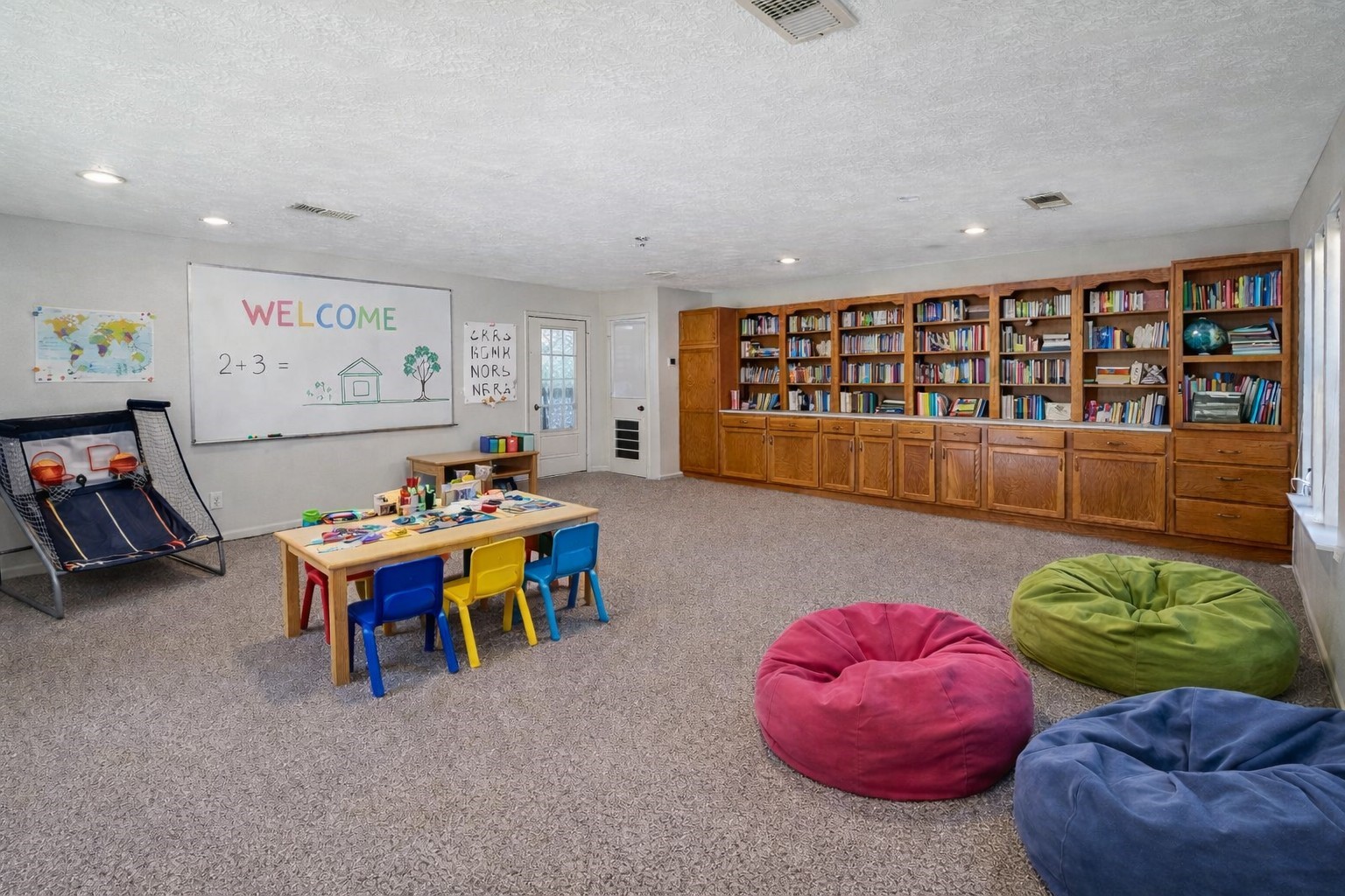 17423 Fairway Oaks Drive Spring, TX 77379 - Photo 27 of 50 a living room with furniture and a large window