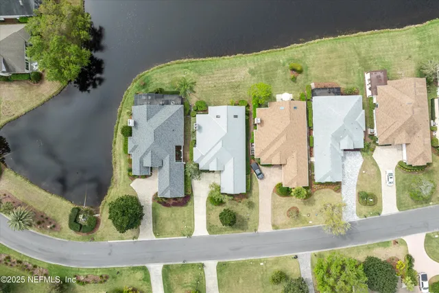 an aerial view of residential house with outdoor space