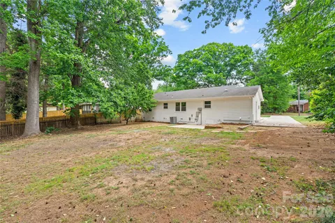 a house with trees in front of it
