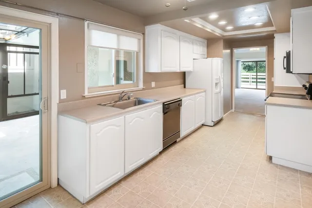 a kitchen with a stove and a microwave