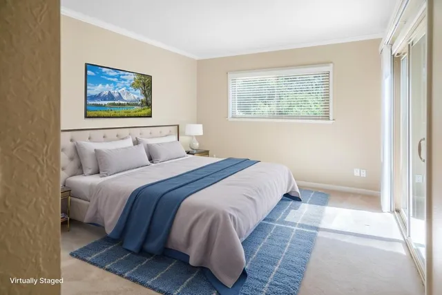 a view of a balcony with wooden floor and fence