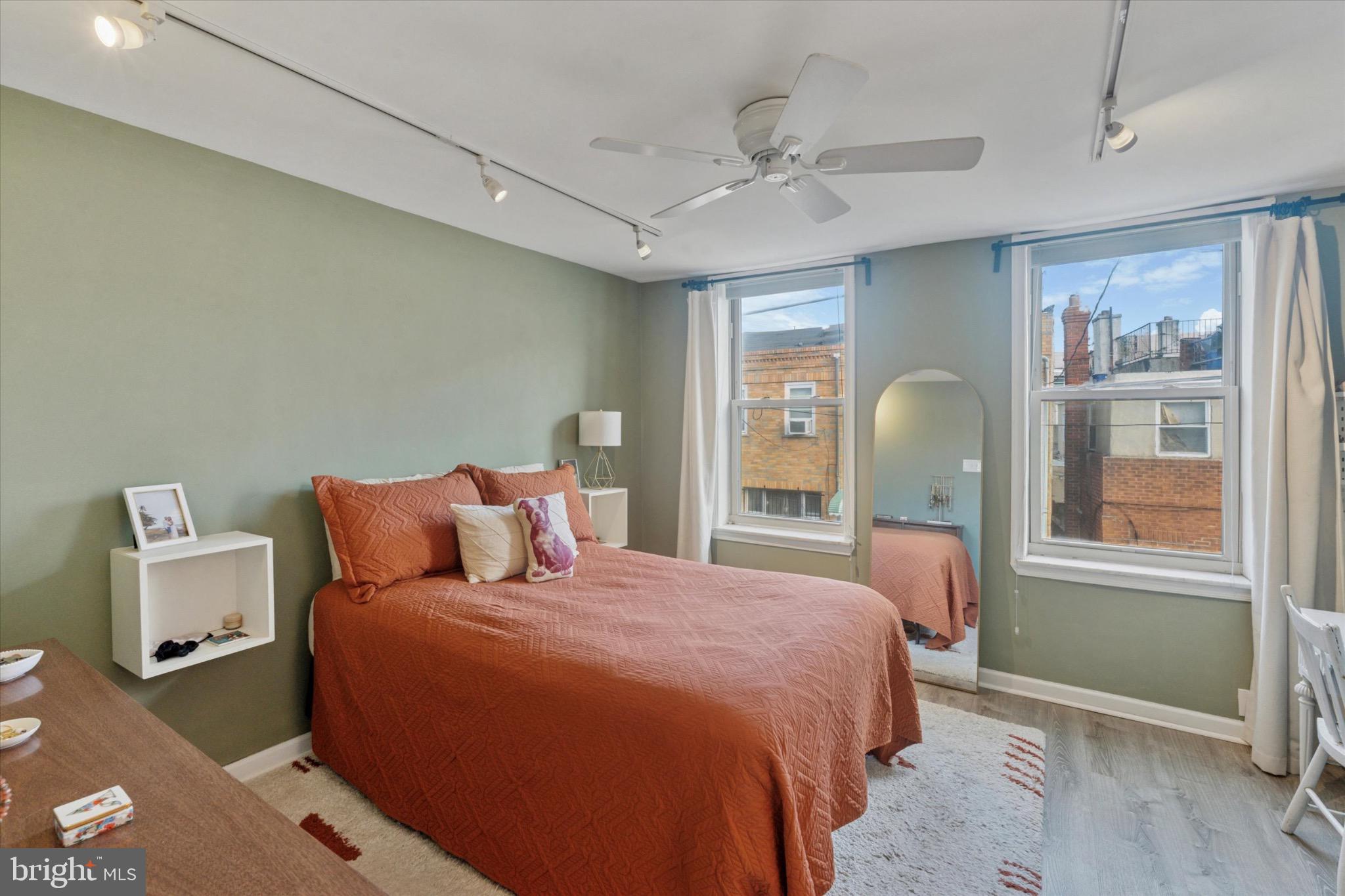 804 Sears Street Philadelphia, PA 19147 - Photo 11 of 25 a bedroom with a large bed and a window