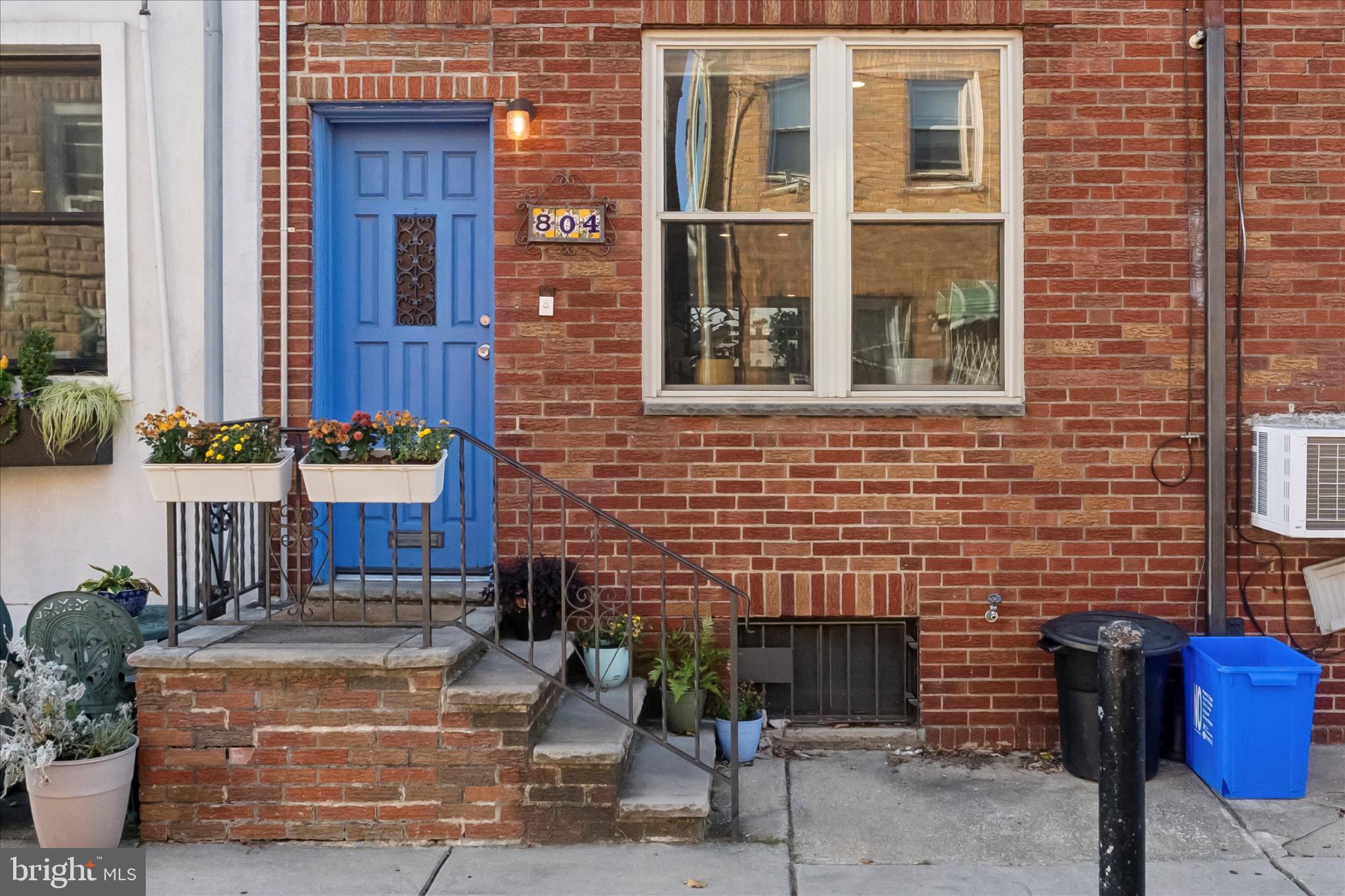 804 Sears Street Philadelphia, PA 19147 - Photo 25 of 25 a front view of a house with outdoor seating