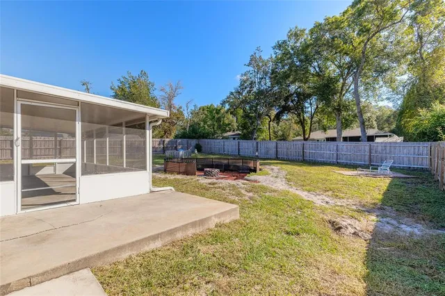 a view of a swimming pool with lounge chair