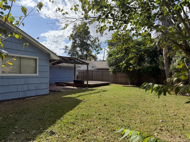 7030 Sharpview Drive Houston, TX 77074 - Photo 20 of 20 a house view with a backyard space