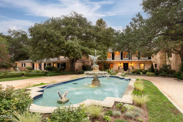 an aerial view of a house with a garden