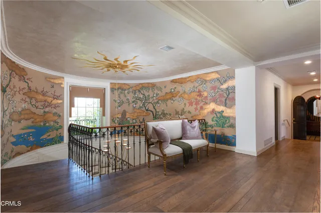 a spacious bathroom with a double vanity sink a toilet a window and tub