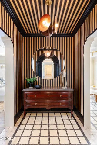 a view of wooden floor and windows in a room