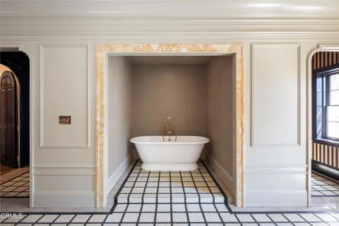 a front view of a house with a garage